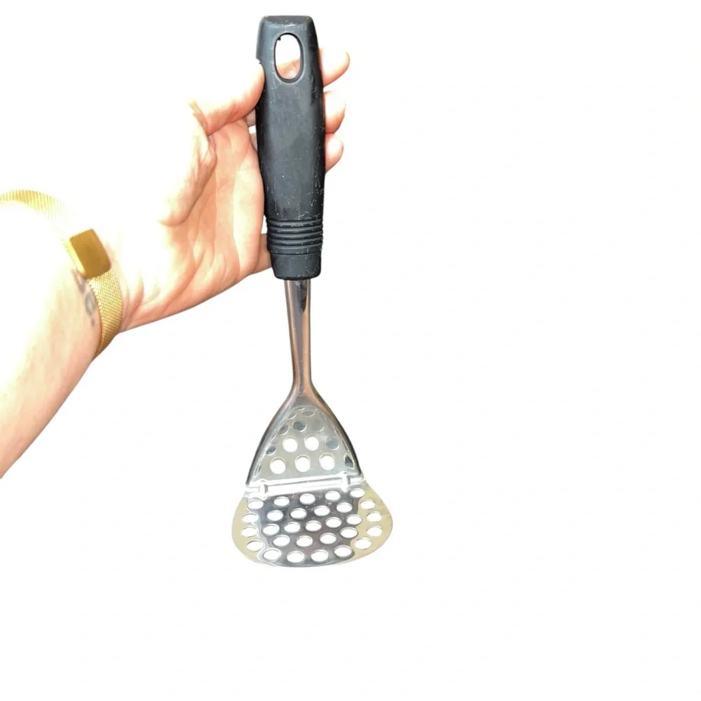 Stainless steel curved potato masher